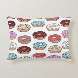 Multi-colored donuts hand drawn seamless pattern. decorative cushion