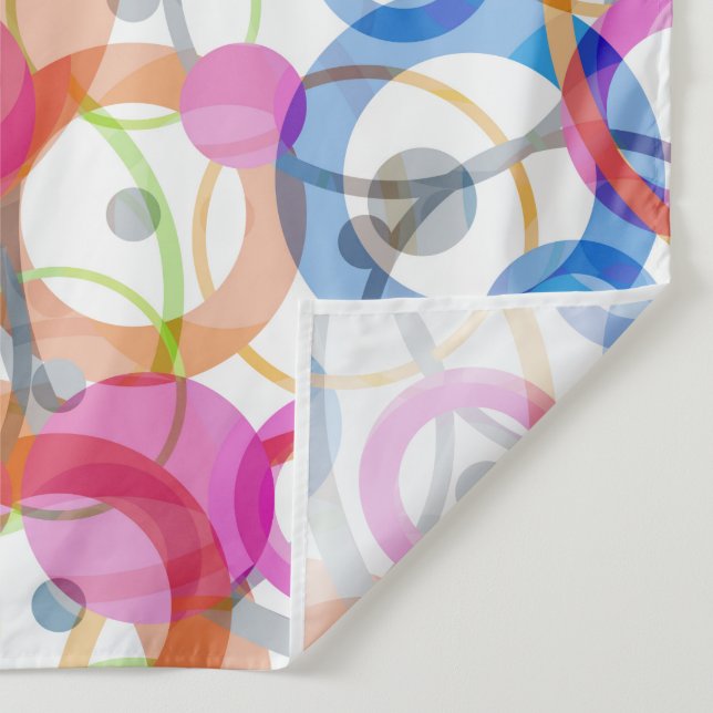 Multi-coloured polka dots, circles on a white tapestry (Detail)