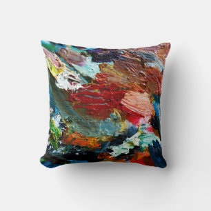 multi-coloured strokes of oil paint on the artist' cushion