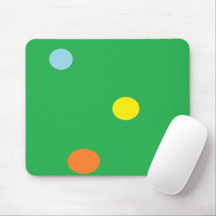 Multicolor circles on green mouse mat