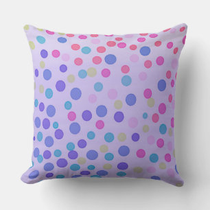 Multicolor pastel dots on purple cushion