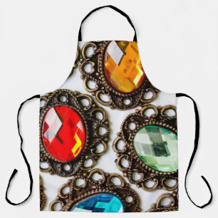 Multicolor vintage brooches on white backgroundbro apron