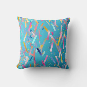 Multicolored confetti background on blue cushion