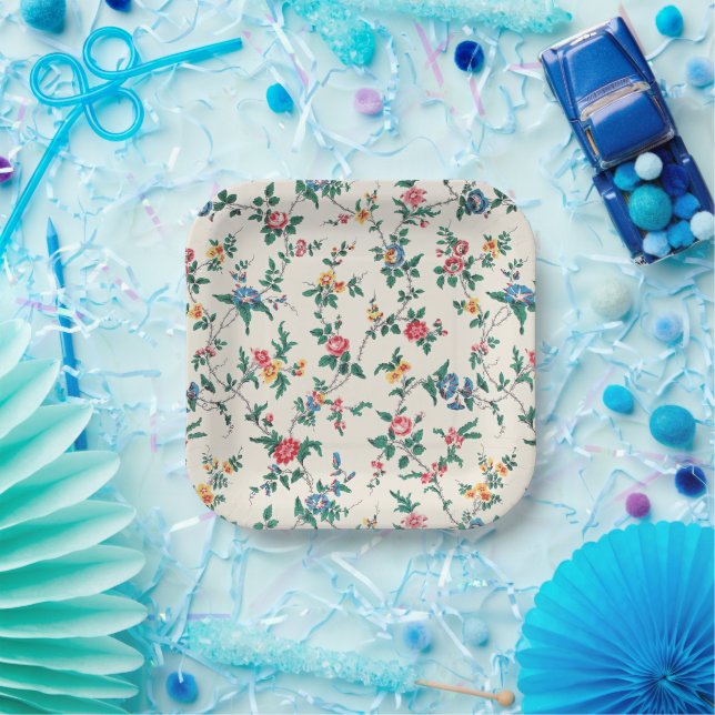 Multicolored flower pattern on white paper plate (Party)