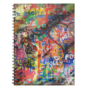 Multicolored graffiti on concrete wall notebook