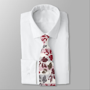 Multicolored leaves on a striped background. tie
