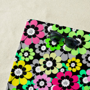 Multicolored paper cut flowers on black background beach towel