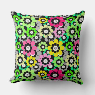 Multicolored paper cut flowers on black background cushion