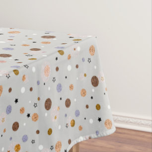 Multicolored polka dots on grey. tablecloth