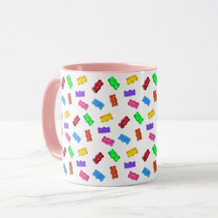Multicolored sweet bears on white mug