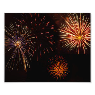Multiple bursts of fireworks against black photo print
