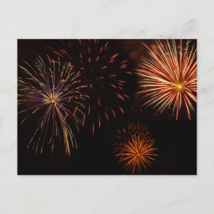 Multiple bursts of fireworks against black postcar postcard