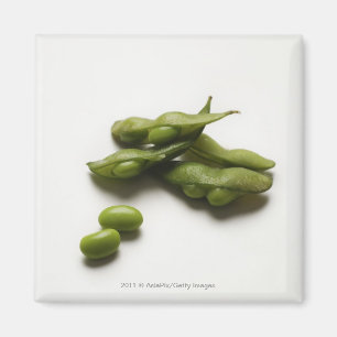 multiple green edamame beans with pea pod broken magnet
