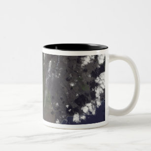 Multiple plumes blow towards the south-southwest Two-Tone coffee mug