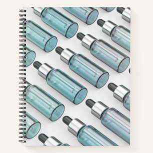 Multiple rows of glass dropper bottles notebook