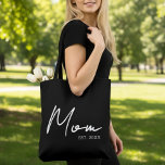Mum Established New Mum Gift Tote Bag<br><div class="desc">Celebrate the year she officially became a Mum with this stylish and thoughtful tote bag. Featuring a modern, clean design, the customisable word "Mum" is boldly displayed with "Est." followed by the customisable year. It's the perfect gift for Mother's Day, a new mum, a pregnancy announcement, or any day she...</div>