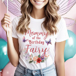 Mummy of the Birthday Fairy Parent's Party T-Shirt<br><div class="desc">Celebrate your little one's special day in style with our "Mother of the Birthday Fairy" T-Shirt. This enchanting shirt features whimsical fonts and a charming floral bouquet with butterflies, perfectly matching the colour palette of our Fairy First Birthday collection. Crafted from soft, high-quality fabric, this shirt ensures comfort and elegance...</div>