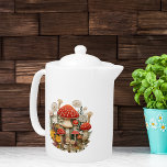 Mushroom Cottagecore Teapot<br><div class="desc">Share your love of nature with this whimsical, 3-D like design of colourful mushrooms and wildflowers. This unique teapot would be the perfect addition to your kitchen decor or as a gift for that special person for any occasion!</div>