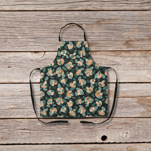 Mushrooms and leafy greens black apron