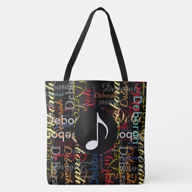 music note with a pattern of colourful names on bl tote bag (Front)