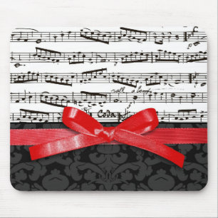Music notes and faux red ribbon mouse mat