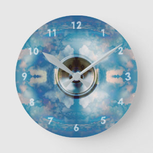 Music speaker and cloudy blue sky round clock
