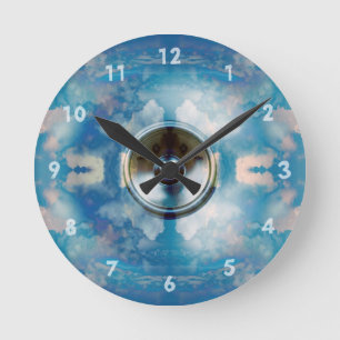 Music speaker and cloudy blue sky round clock