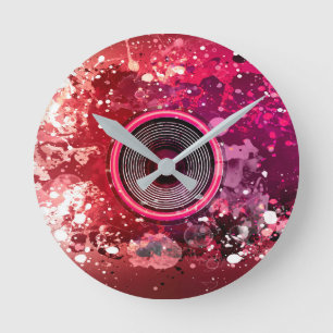 Music speaker and paint splatters round clock