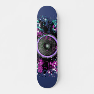 Music speaker and splattered paint skateboard