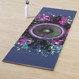 Music speaker and splattered paint yoga mat