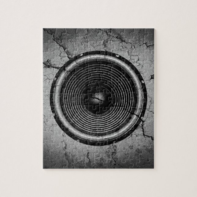 Music speaker on a cracked wall jigsaw puzzle (Vertical)