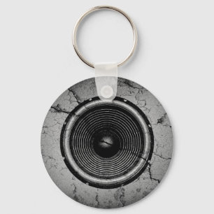 Music speaker on a cracked wall key ring