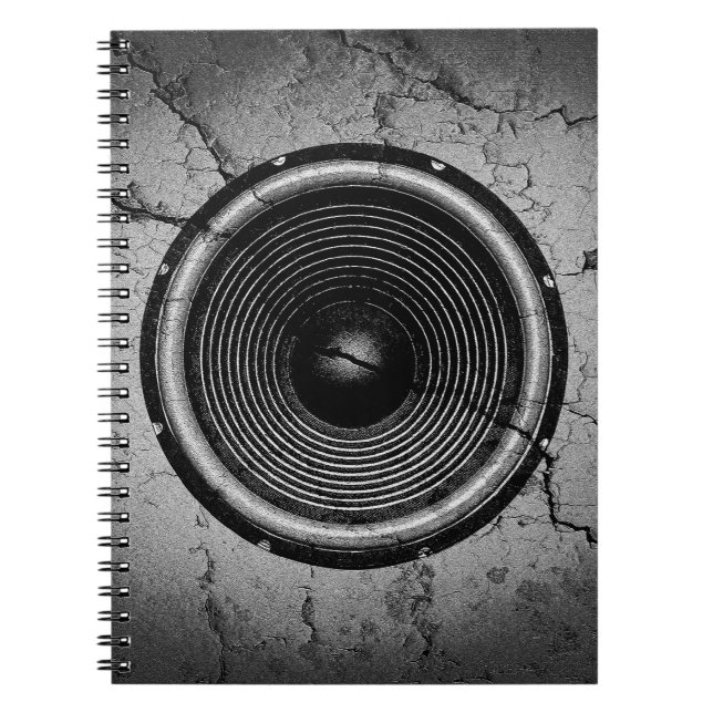 Music speaker on a cracked wall notebook (Front)