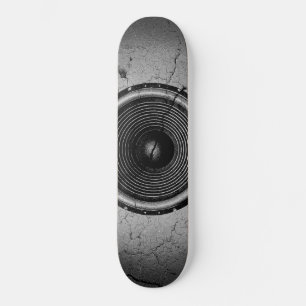 Music speaker on a cracked wall skateboard