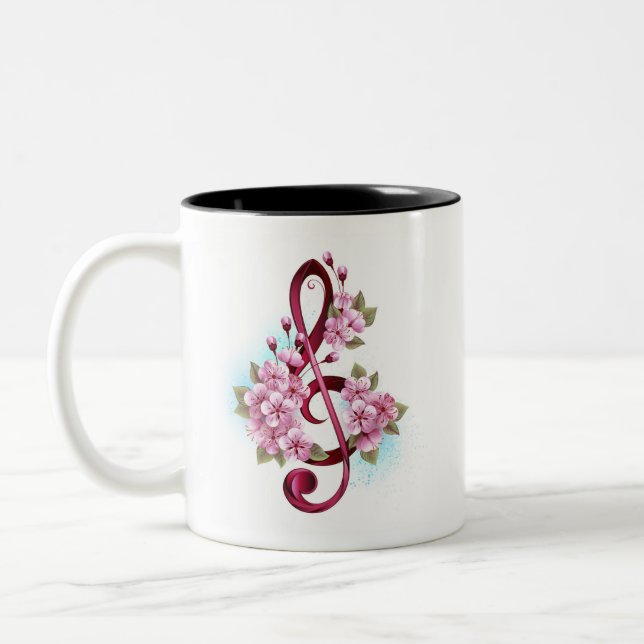Musical treble clef notes with Sakura flowers Two-Tone Coffee Mug (Left)