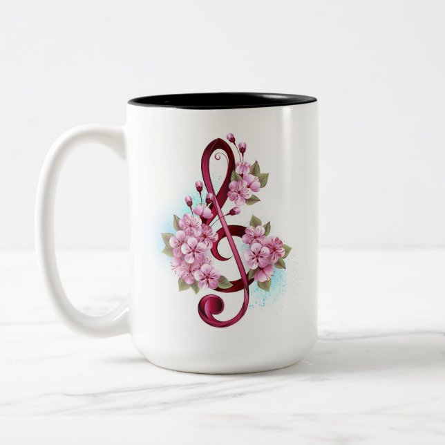 Musical treble clef notes with Sakura flowers Two-Tone Coffee Mug (Left)