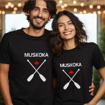 Muskoka Canada Crossed Paddle Oars Maple Leaf Dark T-Shirt<br><div class="desc">Shows two crossed canoe paddles, a red Canadian maple leaf, and "Muskoka" above. Oars and text are white. Evokes the great Canadian outdoors. Design for people who own a cottage in Muskoka and/or Lake Muskoka, for Ontarians, Canadians, American tourists, visitors. For people who like nature, water sports, canoeing, kayaking, rowing,...</div>