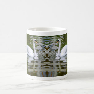 Mute swan with nestlings on water coffee mug