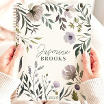 Muted Watercolor Floral 2025 Custom Name Planner<br><div class="desc">Embrace the gentle beauty of muted blooms with this elegant planner. Watercolor florals in soft shades of lavender and grey create a serene backdrop for your dreams and aspirations. Imagine yourself jotting down your thoughts and appointments amidst this tranquil garden. Personalise it with your name and let this planner be...</div>