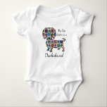 My Big Sister is a Dachshund Bodysuit<br><div class="desc">Enjoy this stylish bodysuit designed by Becky Torres Designs featuring her playful Dachshund from her Adult Colouring Book "Dogs."  Makes a great gift for the Doxie lover in your life!</div>