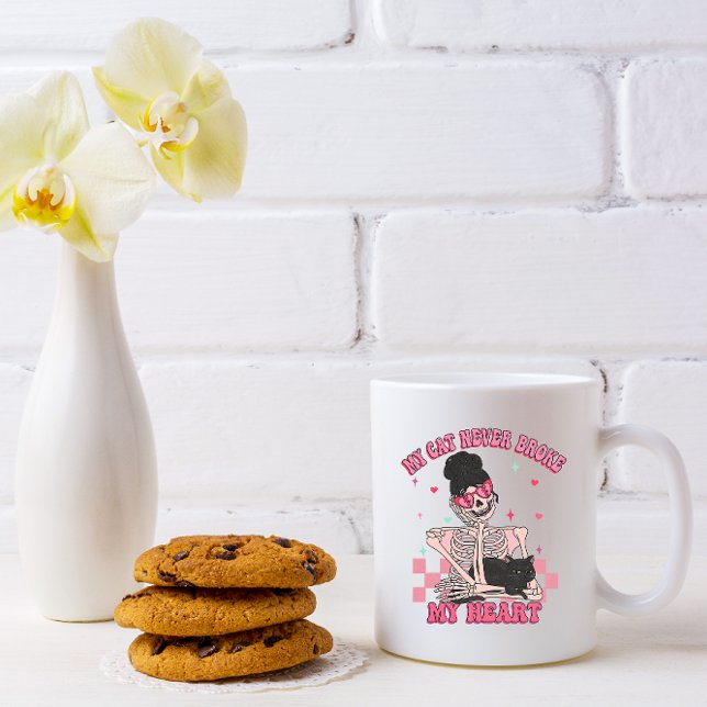 my cat never broke my heart Coffee Mug (Creator Uploaded)