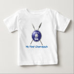 My First Chanukkah Maccabee Baby T-Shirt<br><div class="desc">A depiction of a Maccabee's shield and two spears. The shield is adorned by a lion and text reading "Yisrael" (Israel) in the Paleo-Hebrew alphabet. Customisable text reading "My First Chanukkah" also appears. The Maccabees were Jewish rebels who freed Judea from the yoke of the Seleucid Empire. Chanukkah is not...</div>