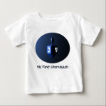 My First Chanukkah Shiny Blue Dreidel Baby T-Shirt<br><div class="desc">A modernistic,  metallic blue dreidel against a dark,  night-like background.  Two of the Hebrew letters found on a dreidel,  nun and shin,  glow brightly. Customisable text reading "My First Chanukkah" also appears. Chanukkah is the mid-winter "Festival of Lights."</div>