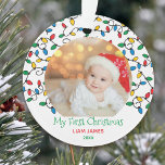 My First Christmas Christmas Lights Baby Photo Ornament<br><div class="desc">Custom photo Christmas ornament with colourful Christmas lights and editable wording. The photo template is set up for you to add one of your favourite pictures pictures, which will be framed with string light bulbs in red blue green and yellow. The wording currently reads My First Christmas [name] 20xx and...</div>