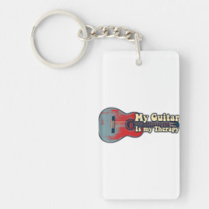 My guitar is my therapy. vintage red and blue key ring