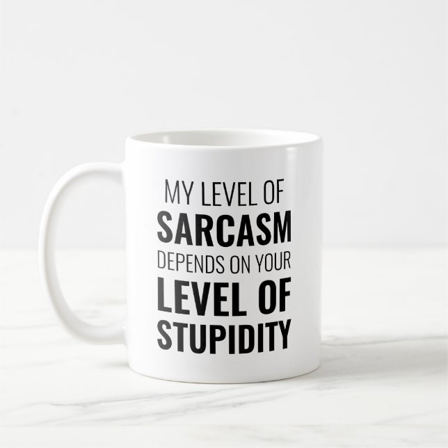 my level of sarcasm depends on your stupidity coffee mug (Left)