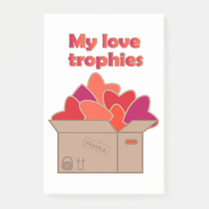My love trophies in box full of Valentines hearts Post-it Notes