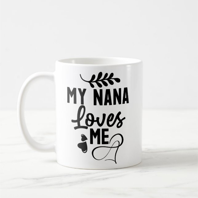 My nana loves me baby bodysuit coffee mug (Left)