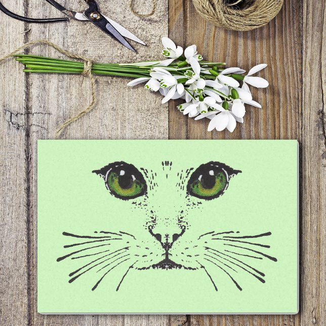 Mysterious Cat Face Green Eyes Long Whiskers Tissue Paper (Mysterious black cat face green eyes long whiskers on light green wrapping tissue paper sheets.)
