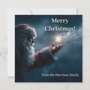 Mysterious Santa Claus Blowing a Glowing Snowflake Holiday Card